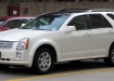 Cadillac SRX - первое поколение в белом цвете