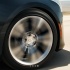 Cadillac CTS - колесо в движении крупным планом